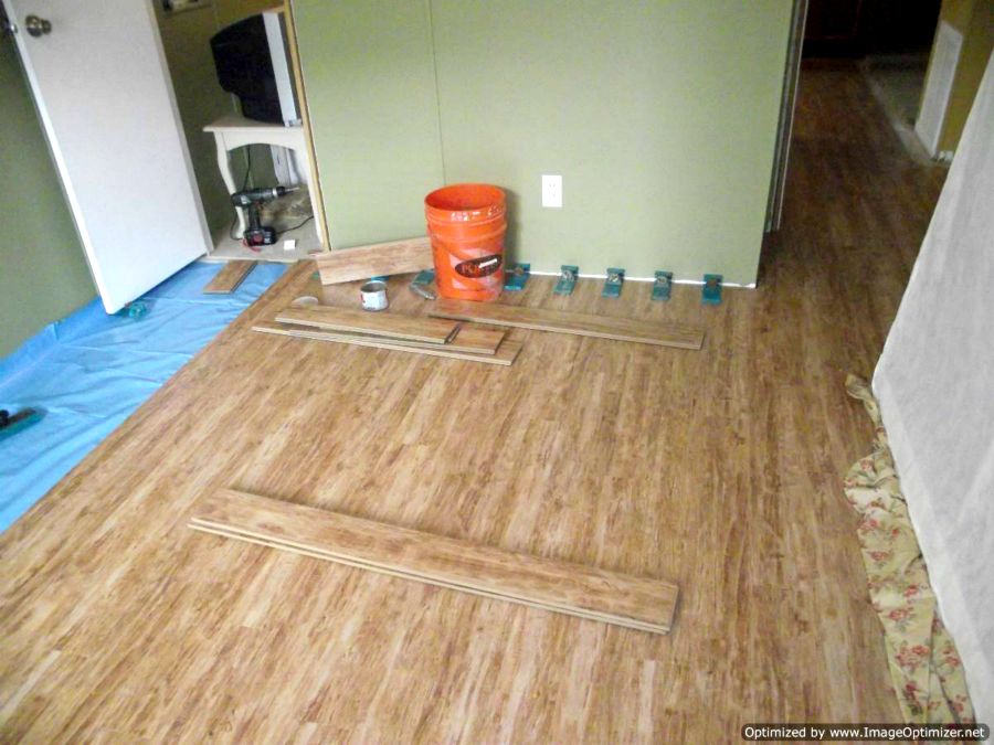 Kensington Manor, Dream Home, laminate flooring installed from bedroom into hallway.