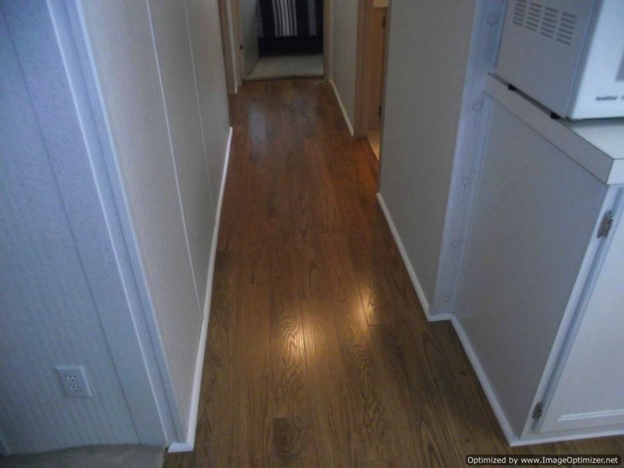 Pergo XP laminate flooring installed in hallway.