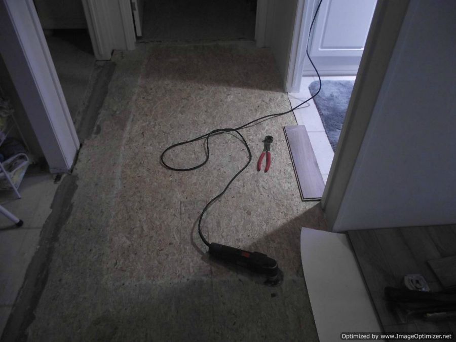 Nirvana V-groove laminate flooring installation, doing hallway preparation