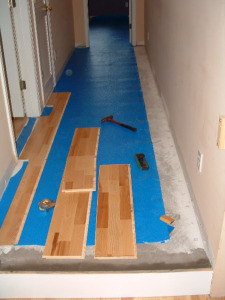 Starting the installation of the Kahrs floating wood flooring.