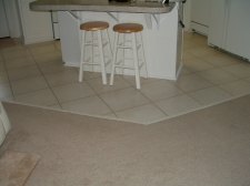 Quick step laminate tile installed in a grid pattern like real ceramic tile