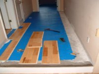 Starting the installation of the Kahrs floating wood flooring.