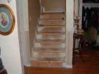 Here is a photo before I installed the laminate flooring on the stairs.