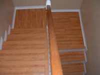 Here is the finished stair case after I installed the laminate flooring on them