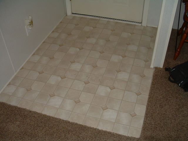 Laminate Flooring Photos Before Quick Step Laminate Tile Is Going To Be Installed In This Foyer