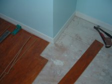 Here is how I cut a laminate flooring plank around a corner.
