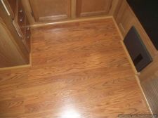 Installing laminate flooring in a travel trailer, installed quarter in the kitchen 