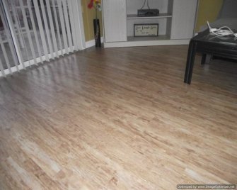 Kensington Manor Dream Home laminate flooring installed in a living room 