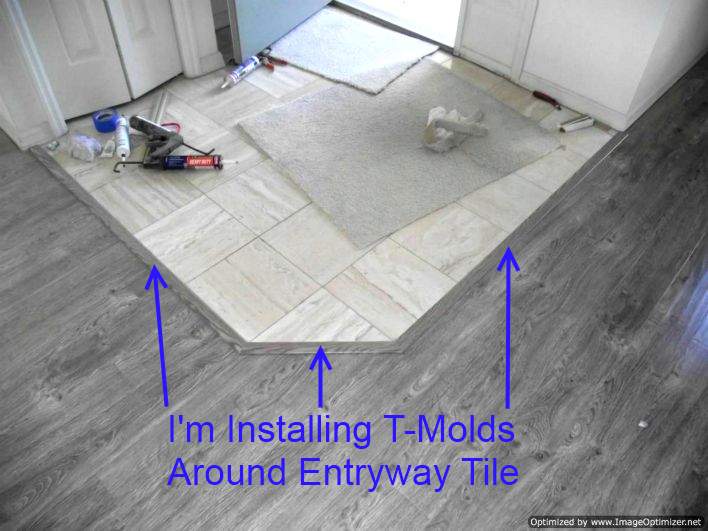 Shaw Gray laminate flooring, installing T-molds at entry tile