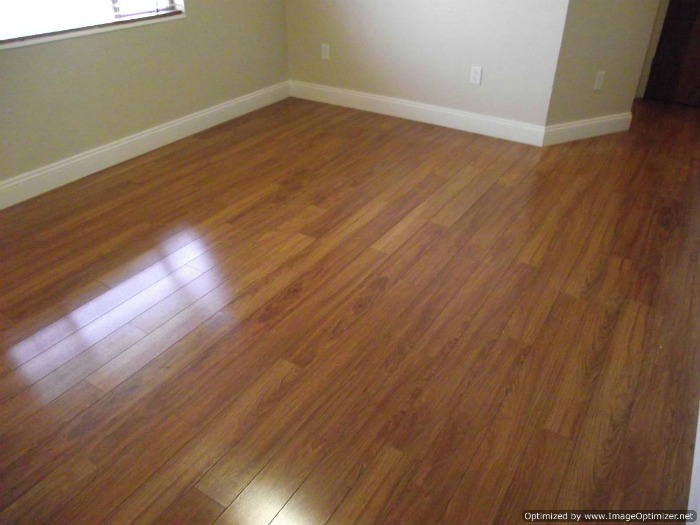 Lowes, Casual Living Berkshire Cherry laminate installed in living room