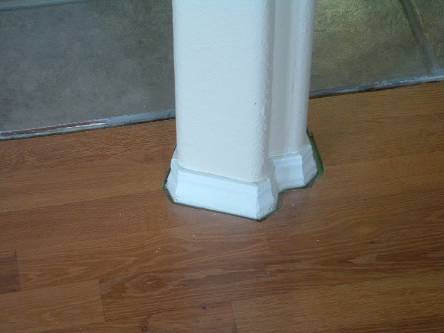 Installing quarter round on round corners, around an odd shaped pillar, Before photo..