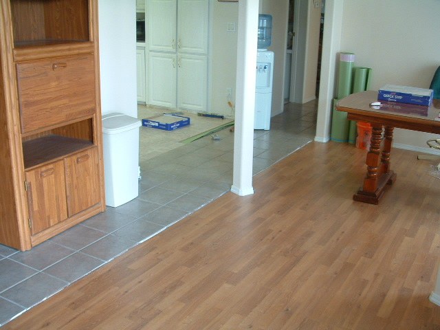 Where laminate meets up to ceramic tile installation