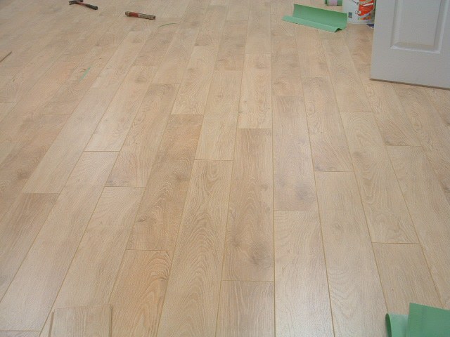 Balterio laminate flooring being installed in a conference room