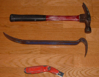 Carpet removel tools, hammer, crowbar and razor knife