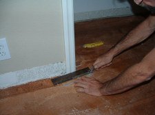 Cutting door jamb with hand saw