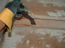 Removing tack strip with pry bar from stairs 