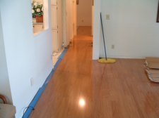 Here I am working down the hallway with the Vanier laminate flooring