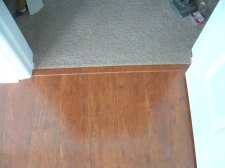 Carpet finished off at laminate transition