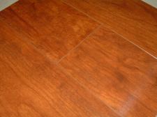 Horizon Williamsburg Cherry laminate from Flooring America close up photo 