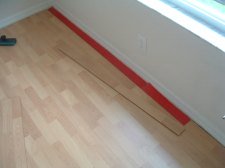 Installing the last row of laminate flooring, Here is the cut laminate that I will install here.