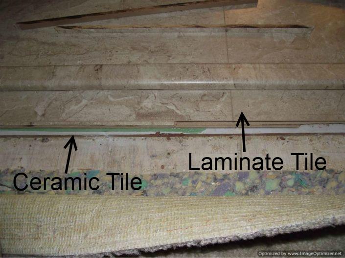 Laminate tile flooring in bathroom over ceramic tile.