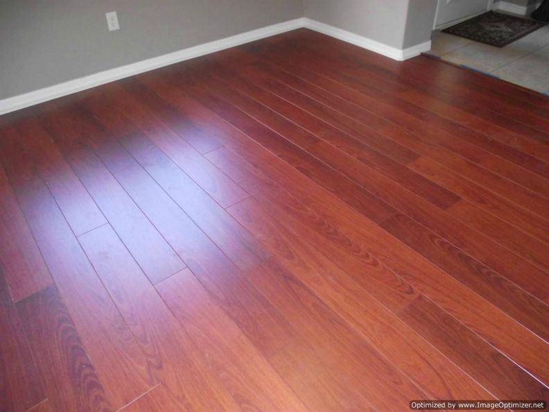 Quick Step Perspective laminate installed in a dinning room