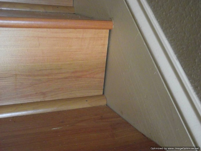 Bad laminate stair installation.