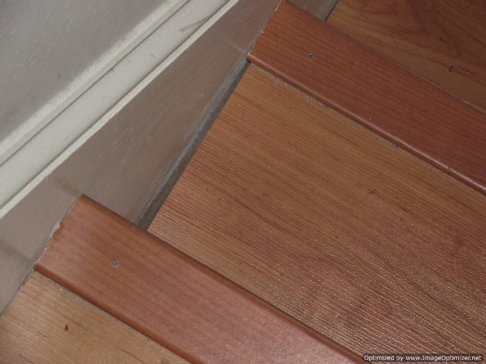 Bad laminate stair installation.