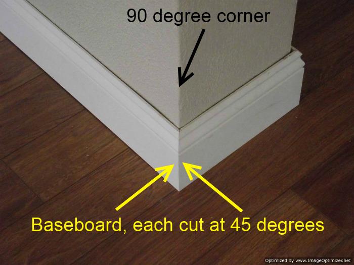 Installing baseboard cutting 45 degree angles to fit 90 degree corner.