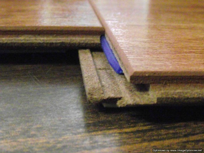Lowes, Casual Living Berkshire Cherry laminate, shows close up of the end joint after its connected.